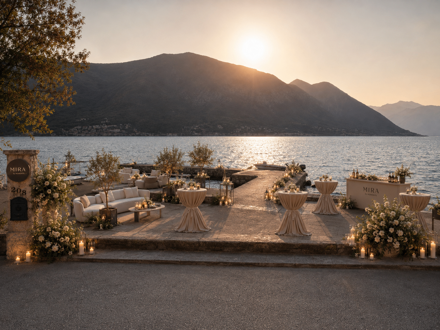 Golden-hour wedding cocktail reception on the waterfront terrace at Mira by Moments, Bay of Kotor